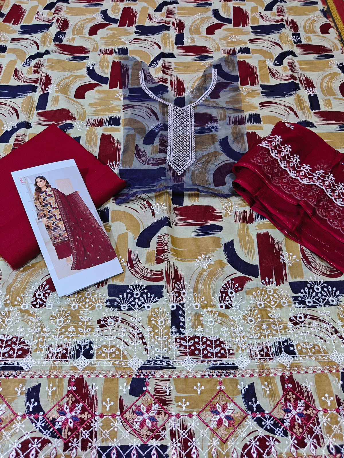 Three piece embroiderd article lawn